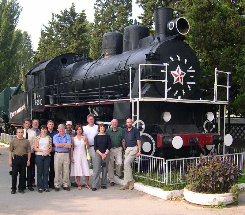 British visitors and their hosts in front of historic military locomotive, Sebastopol'